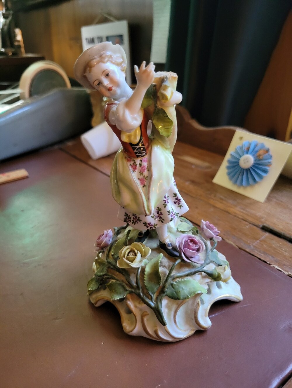 antique porcelain figurine, likely German from around 1900-repaired